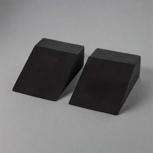 Two black yoga wedge blocks